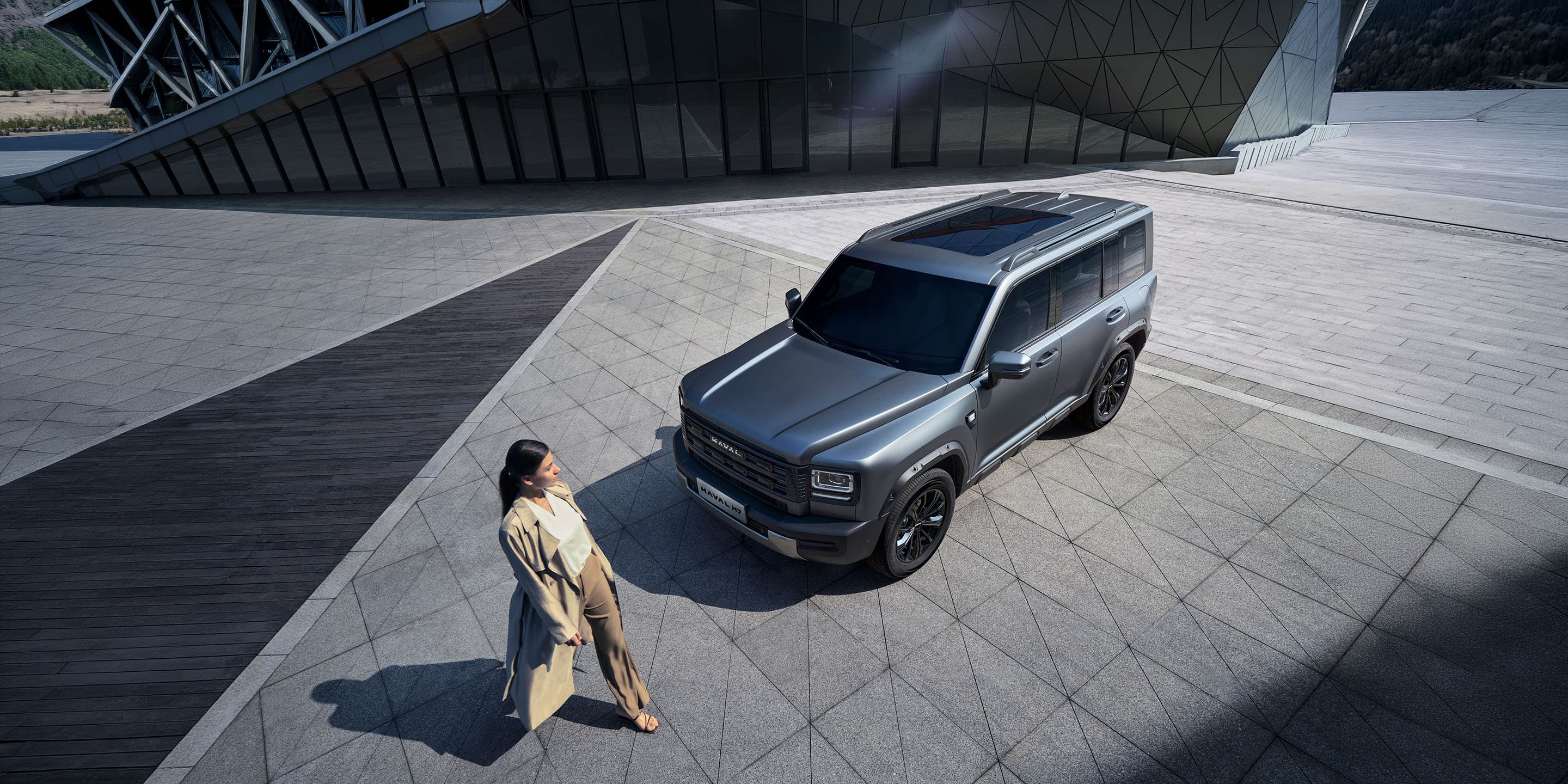 All-New HAVAL H7 in Matte Grey parked on a city plaza